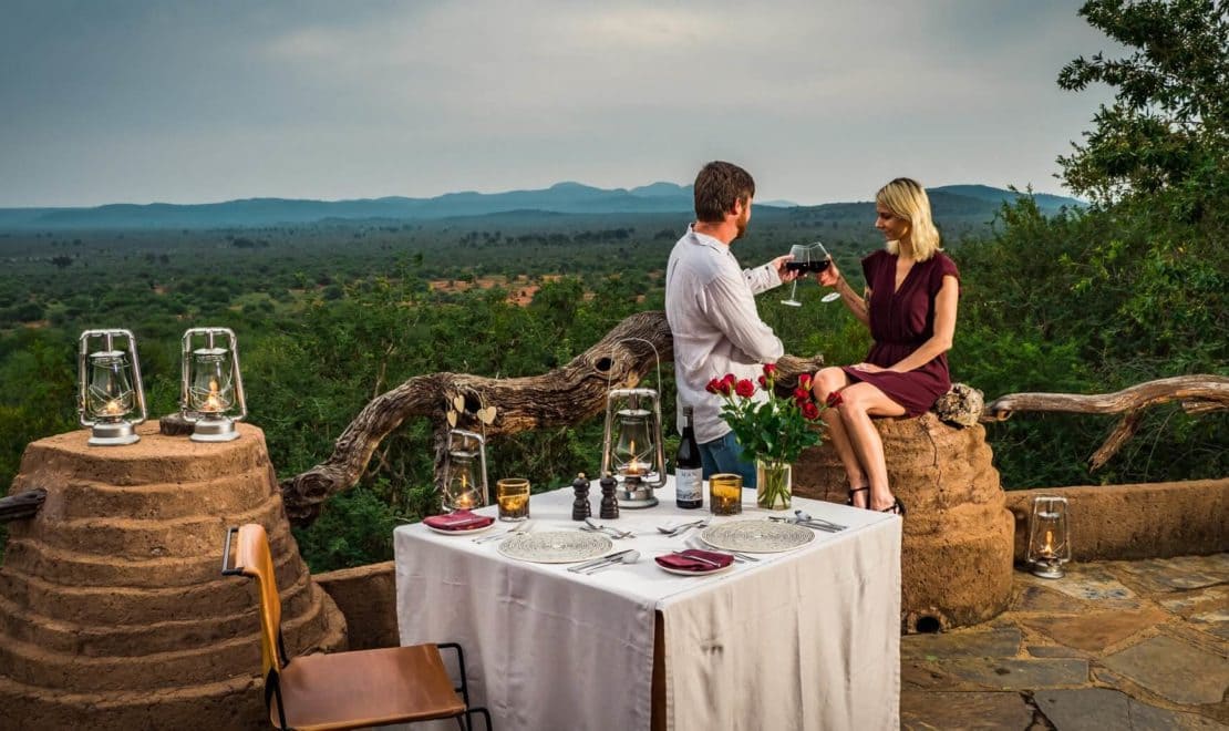 honeymoon safari in Uganda, romantic safari Africa, couple on safari, private lodge Uganda, gorilla trekking honeymoon, safari dinner setup, Uganda sunset romance, honeymoon travel Uganda, safari proposal ideas, romantic getaway East Africa